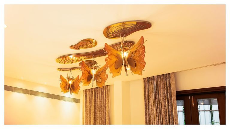 DINING AREA | BUTTERFLY-THEMED CEILING INSTALLATION