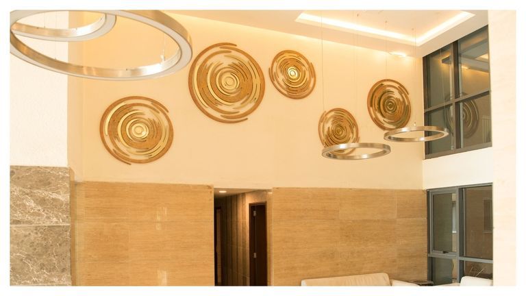 DOUBLE HEIGHT LOBBY WALL